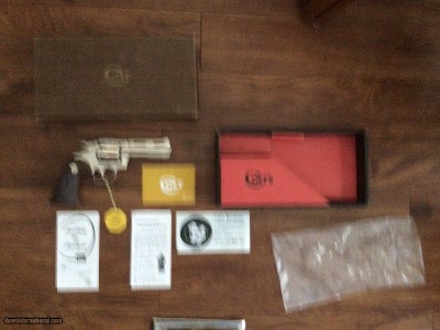 COLT DIAMONDBACK 22 LR. 4” BRIGHT NICKEL, NEW UNFIRED, UNTURNED 100% COND.IN THE BOX WITH OWNERS MANUAL, HANG TAG ETC.