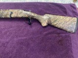 RUGER RED LABEL, ALL WEATHER FACTORY CAMOUFLAGE 12 GA. 28” BARRELS, EXC. COND.