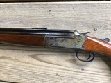 SAVAGE 24, 22 LR. OVER 410 GA. DESIRABLE MODEL WITH SIDE BUTTON BARREL SELECTOR, CASE COLORED RECEIVER & WALNUT WOOD, EXC. COND. - 7 of 9