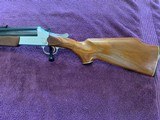 SAVAGE 24 DELUXE 22 LR. OVER 20 GA. HAS POPULAR SIDE BUTTON BARREL SELECTOR, SATIN SILVER ENGRAVED RECEIVER,EXC. COND. - 2 of 5