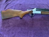 SAVAGE 24 DELUXE 22 LR. OVER 20 GA. HAS POPULAR SIDE BUTTON BARREL SELECTOR, SATIN SILVER ENGRAVED RECEIVER,EXC. COND. - 3 of 5