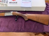 RUGER RED LABEL 28 GA. 28” BARRELS NEW UNFIRED IN THE BOX WITH OWNERS MANUAL 5 CHOKE TUBES & WRENCH