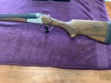 REMINGTON SPR 210, DOUBLE BARREL 12 GA., 28” CHOKE TUBE BARRELS 3” CHAMBERS, EXC. COND. - 1 of 5