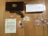 COLT PYTHON 357 MAGNUM, 6” BRIGHT NICKEL, MFG. 1975, NEW IN THE BOX, WITH OWNERS, HANG TAG, COLT LETTER ETC.