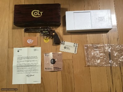 COLT PYTHON 357 MAGNUM, 6” BRIGHT NICKEL, MFG. 1975, NEW IN THE BOX, WITH OWNERS, HANG TAG, COLT LETTER ETC.
