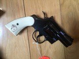 COLT PYTHON 357 MAGNUM “SNAKE EYES” NEW IN BOXES WITH COLT LETTERS, OWNERS MANUALS, HANG TAGS, ETC. SERIAL NUMBERS 201 - 7 of 12