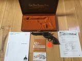 COLT SAA 44 SPECIAL 5 1/2” BLUE BARREL, CASE COLORED FRAME, A FACTORY ENGRAVED IN THE COLT CUSTOM SHOP, COMES WITH OWNERS MANUAL, HANG TAG - 1 of 6