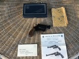 SMITH & WESSON 34-1, 22 LR. CAL. 2” BARREL ADJUSTABLE SIGHTS, NEW IN THE BOX WITH OWNERS MANUAL, ETC. - 1 of 5