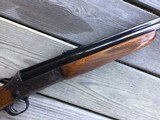 SAVAGE 24, 22 LR. OVER 410 GA., OLER MODEL WITH DESIRABLE SIDE BUTTON SELECTOR, FACTORY CHECKERED WALNUT WOOD, CASE COLORED RECEIVER, 99% COND. - 5 of 7