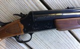 SAVAGE 24 DLX., 22 LR. OVER 20 GA., BLUE ENGRAVED RECEIVER WITH RED FOX ON ONE SIDE & GROUSE IN FLIGHT ON THE OTHER SIDE - 4 of 9