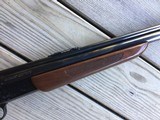 SAVAGE 24 DLX., 22 LR. OVER 20 GA., BLUE ENGRAVED RECEIVER WITH RED FOX ON ONE SIDE & GROUSE IN FLIGHT ON THE OTHER SIDE - 7 of 9