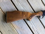 SAVAGE 24 DLX., 22 LR. OVER 20 GA., BLUE ENGRAVED RECEIVER WITH RED FOX ON ONE SIDE & GROUSE IN FLIGHT ON THE OTHER SIDE - 2 of 9