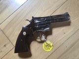 COLT PYTHON 357 MAGNUM, BRIGHT NICKEL 4” BARREL, NEW UNFIRED IN THE BOX WITH OWNERS MANUAL, HANG TAG, COLT LETTER, ETC. MFG 1972 - 4 of 7