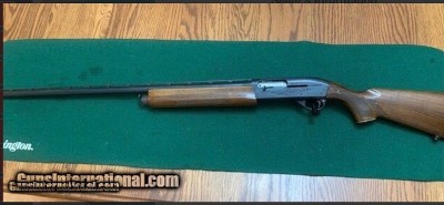REMINGTON 1100, 12 MAGNUM, LEFT HAND 30” FULL CHOKE VENT RIB, GOOD COND.