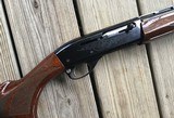 REMINGTON 1100 410 GA., 25” MOD. CHOKE, VENT RIB, 3” CHAMBER, SHOOTS 2 1/2” or 3” SHELLS, 99% BLUE, WITH SOME HANDLING MARKS IN THE WOOD - 3 of 10