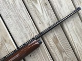 REMINGTON 1100 410 GA., 25” MOD. CHOKE, VENT RIB, 3” CHAMBER, SHOOTS 2 1/2” or 3” SHELLS, 99% BLUE, WITH SOME HANDLING MARKS IN THE WOOD - 5 of 10