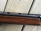 REMINGTON 1100 410 GA., 25” MOD. CHOKE, VENT RIB, 3” CHAMBER, SHOOTS 2 1/2” or 3” SHELLS, 99% BLUE, WITH SOME HANDLING MARKS IN THE WOOD - 8 of 10