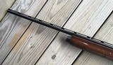 REMINGTON 1100 410 GA., 25” MOD. CHOKE, VENT RIB, 3” CHAMBER, SHOOTS 2 1/2” or 3” SHELLS, 99% BLUE, WITH SOME HANDLING MARKS IN THE WOOD - 10 of 10