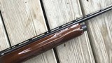 REMINGTON 1100 410 GA., 25” MOD. CHOKE, VENT RIB, 3” CHAMBER, SHOOTS 2 1/2” or 3” SHELLS, 99% BLUE, WITH SOME HANDLING MARKS IN THE WOOD - 4 of 10