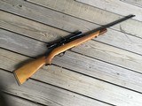 WEATHERBY XII, 22 AUTO, COMES WITH WEATHERBY 4X-50, SCOPE, 100% COND. NOT A MARK ON IT