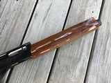 REMINGTON 1100, 16 GA. 28” MOD., VENT RIB, NEW UNFIRED, 100% COND. IN THE DUPONT BOX WITH HANG TAG, OWNERS MANUAL IN PLASTIC & WOODEN DUCK PLUG - 4 of 8