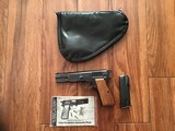 BROWNING BELGIUM HI POWER 9 MM, T- SERIES MFG. 1969, RING HAMMER, NEW UNFIRED, COMES WITH 2 ORIGINAL MAGAZINES, OWNERS MANUAL& ZIPPER POUCH - 1 of 4