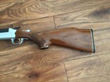 SAVAGE 24 DLX. 22 LR. OVER 410 GA. SATIN SILVER ENGRAVED RECEIVER WITH RED FOX ON ONE SIDE & GROUSE IN FLIGHT ON THE OTHER SIDE, EXC. COND. - 2 of 10