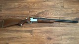 SAVAGE 24 DLX. 22 LR. OVER 410 GA. SATIN SILVER ENGRAVED RECEIVER WITH RED FOX ON ONE SIDE & GROUSE IN FLIGHT ON THE OTHER SIDE, EXC. COND. - 6 of 10