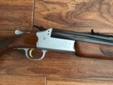 SAVAGE 24 DLX. 22 LR. OVER 410 GA. SATIN SILVER ENGRAVED RECEIVER WITH RED FOX ON ONE SIDE & GROUSE IN FLIGHT ON THE OTHER SIDE, EXC. COND. - 8 of 10