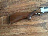 SAVAGE 24 DLX. 22 LR. OVER 410 GA. SATIN SILVER ENGRAVED RECEIVER WITH RED FOX ON ONE SIDE & GROUSE IN FLIGHT ON THE OTHER SIDE, EXC. COND. - 7 of 10