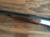 SAVAGE 24 DLX. 22 LR. OVER 410 GA. SATIN SILVER ENGRAVED RECEIVER WITH RED FOX ON ONE SIDE & GROUSE IN FLIGHT ON THE OTHER SIDE, EXC. COND. - 4 of 10