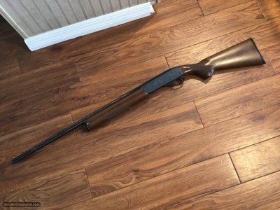 REMINGTON 1100, 410 GA. 25” REM-CHOKE, VENT RIB, FACTORY ENGRAVED WITHENGLISH SETTER & QUAIL ON THE RECEIVER, ENGLISH POINTER & QUAIL ON OTHER SIDE