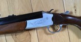 SAVAGE 24 DELUXE 22 MAGNUM OVER 410 GA. ENGRAVED RECEIVER WITH GROUSE ON ONE SIDE & RED FOX ON THE OTHER SIDE, POPULAR SIDE BUTTON BARREL SELECTOR - 6 of 9