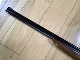SAVAGE 24 DELUXE 22 MAGNUM OVER 410 GA. ENGRAVED RECEIVER WITH GROUSE ON ONE SIDE & RED FOX ON THE OTHER SIDE, POPULAR SIDE BUTTON BARREL SELECTOR - 8 of 9