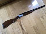 SAVAGE 24 DELUXE 22 MAGNUM OVER 410 GA. ENGRAVED RECEIVER WITH GROUSE ON ONE SIDE & RED FOX ON THE OTHER SIDE, POPULAR SIDE BUTTON BARREL SELECTOR