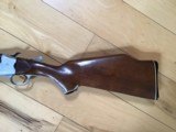 SAVAGE 24 DELUXE 22 MAGNUM OVER 410 GA. ENGRAVED RECEIVER WITH GROUSE ON ONE SIDE & RED FOX ON THE OTHER SIDE, POPULAR SIDE BUTTON BARREL SELECTOR - 9 of 9