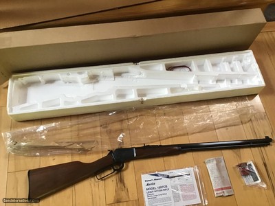 MARLIN 1897 COWBOY 22 LR. 24
OCTAGON, MICRO GROOVE BARREL, JM STAMPED, UNFIRED IN THE BOX WITH OWNERS MANUAL, SCOPE BASE, ETC.