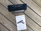 SMITH & WESSON 52 NO DASH 38 SPC. NEW UNFIRED IN THE BOX WITH OWNERS MANUAL,BOTH FACTORY MAGAZINES & OIL PAPER - 4 of 4
