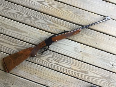 RUGER #1 7X-57 CAL. EARLY MODEL WITH RED RECOIL PAD, VERY FANCY BURL WALNUT 99+% COND.