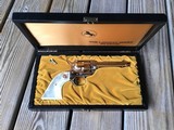 COLT COMMERATIVE “PAT GARRETT” OF THE LAWMAN SERIES FRONTIER SCOUT MADE 1968, 22 LR. NEW UNFIRED IN THE WOODEN DISPLAY CASE - 1 of 5