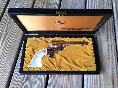 COLT COMMERATIVE “PAT GARRETT” OF THE LAWMAN SERIES FRONTIER SCOUT MADE 1968, 22 LR. NEW UNFIRED IN THE WOODEN DISPLAY CASE