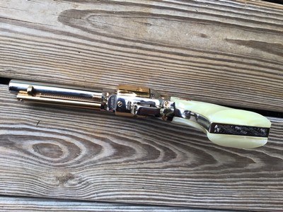 COLT COMMERATIVE “PAT GARRETT” OF THE LAWMAN SERIES FRONTIER SCOUT MADE 1968, 22 LR. NEW UNFIRED IN THE WOODEN DISPLAY CASE - Image 5 of 5