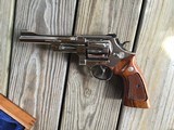 SMITH & WESSON 27-2, 357 MAGNUM 6 1/2” BRIGHT NICKEL, NEW IN FACTORY WOOD PRESENTATION CASE WITH OWNERS MANUAL ETC. - 4 of 4