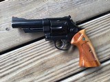 SMITH & WESSON 29-2, 44 MAGNUM 4” BLUE, NEW UNFIRED IN FACTORY WOOD PRESENTATION CASE WITH OWNERS MANUAL ETC. IN THE FACTORY SHIPPING CARTON - 3 of 4