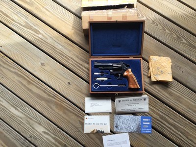SMITH & WESSON 29-2, 44 MAGNUM 4” BLUE, NEW UNFIRED IN FACTORY WOOD PRESENTATION CASE WITH OWNERS MANUAL ETC. IN THE FACTORY SHIPPING CARTON
