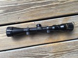 TASCO WORLD CLASS 3X-9X-40 VARIABLE WITH DUPLEX CROSS HAIRS RETICLE, COMES WITH RINGS & MOUNT SET & LENS PROTECTORS - 1 of 2