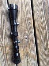 TASCO WORLD CLASS 3X-9X-40 VARIABLE WITH DUPLEX CROSS HAIRS RETICLE, COMES WITH RINGS & MOUNT SET & LENS PROTECTORS - 2 of 2