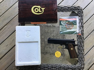 COLT ACE NEW UNFIRED IN THE BOX WITH FACTORY IN COSMOLINE, COMES WITH OWNERS MANUAL, HANG TAG, COLT LETTER, ETC. IMPOSSIBLE TO IMPROVE ON