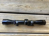 LEUPOLD VARI-X, 2X-7X VARIABLE RIFLE SCOPE, DUPLEX CROSSHAIRS, COMES WITH REDFIELD RINGS & MOUNT THAT FIT REMINGTON 700, GLASS IS CLEAR AS NEW - 2 of 3