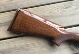 REMINGTON MODEL 7, IN THE LIGHT RECOIL 7MM-08 CAL, WALNUT STOCK
99+% COND. - 2 of 7